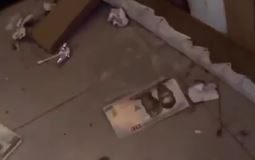 Nigerian Man Shocked To Find Old Naira Notes Stashed Under Bed By Wife (Video)