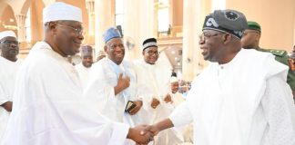 PHOTO: Tinubu, Atiku suspends rivalry, exchange warm handshakes in Abuja mosque