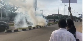 Police teargas protesters in Abuja market