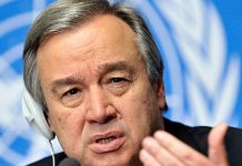 UN raises alarm over xenophobic violence in South Africa Diplomat wearing a headset speaks into a microphone, gesturing with his hand against a UN backdrop.