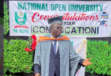 Actor Mr Latin bags BSc from NOUN Graduate in a blue gown and cap speaking at a convocation stage, with a banner reading 'National Open University' and 'Congratulations' in the background.
