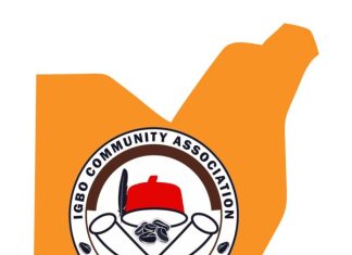 ‘Get your PVCs’, Ohanaeze, ICA urge Igbos resident in Abuja Orange abstract background with an Igbo Community Association circular logo in the center, featuring a red fez hat and crossed white scrolls/swords in black outline.