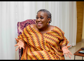 “I was shocked some films got no nominations” – Joke Silva opens up on AMVCA selection process A smiling woman in a colorful zigzag dress sits on a patterned chair, gesturing with open hands as she speaks.