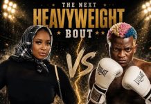 Man vs Woman: Portable challenges female DJ to Celebrity Boxing fight Promotional poster for 'The Next Heavyweight Bout' showing a female fighter in a black outfit and hijab left, and a male boxer with colorful hair right, facing off with a glowing 'VS' between them. The title and lights suggest a high-stakes match.