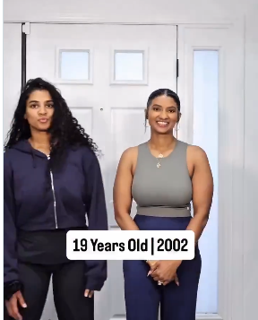 Screenshot 2026-05-16 120344 Two women stand side by side in front of a white door; caption reads '19 Years Old | 2002'.