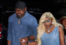 BREAKING: Singer Niniola loses husband Man and woman walking hand in hand at night; man in denim shirt and cap, woman in sleeveless denim top with long blonde hair and jewelry.