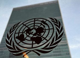 We’re very concerned – UN reacts to terrorists’ attacks on schools in Nigeria United Nations emblem on a reflective glass surface with a blurred building in the background.
