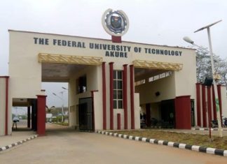 ‘How 100-Level FUTA student was found dead’ Entrance gate to The Federal University of Technology Akure; arches, security gates, and a paved road into the campus.